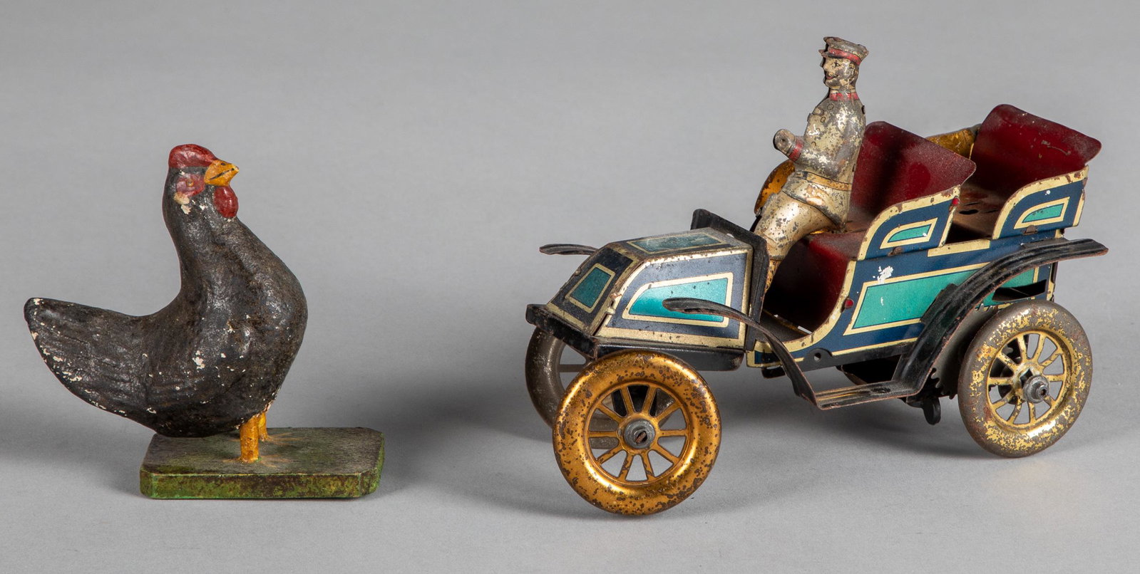 German tin lithograph wind-up touring car, etc.: German tin lithograph wind-up touring car, 6'' l., together with a composition rooster.