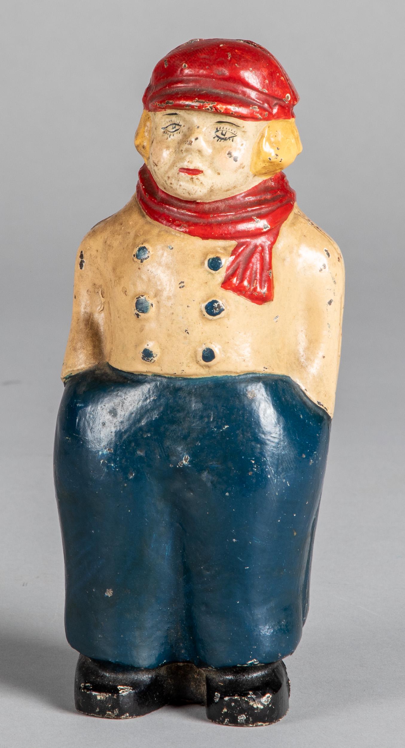Cast iron Dutch boy still bank doorstop: Cast iron Dutch boy still bank doorstop, 8 1/2'' h.