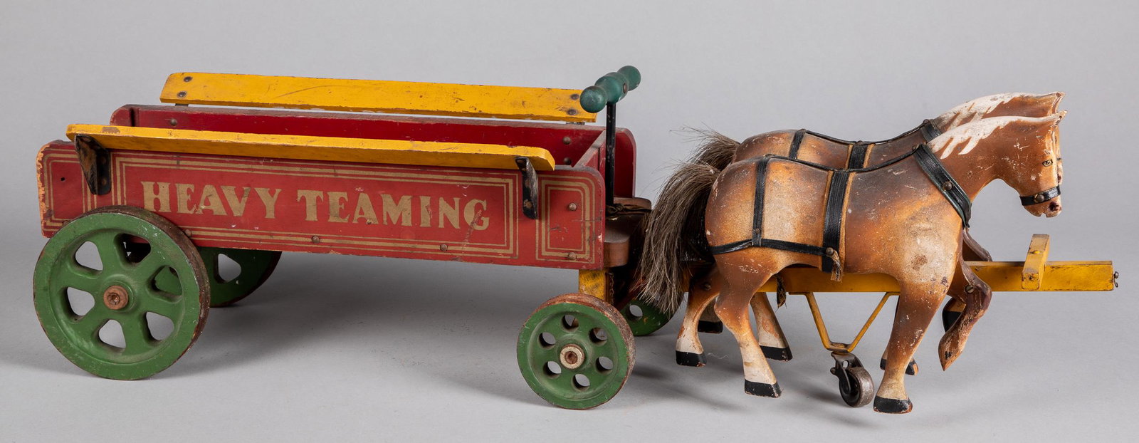 Drive 'em painted wood Heavy Teaming toy wagon,: Drive 'em painted wood Heavy Teaming toy wagon, with two horses, overall length - 36''.