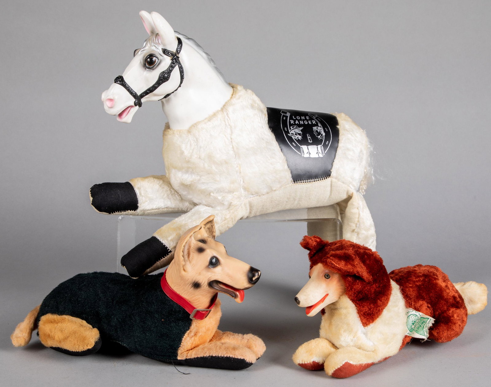 Three plush toys: Three plush toys, to include the Lone Ranger's horse Silver, Rin Tin Tin and Lassie, horse - 15'' l.