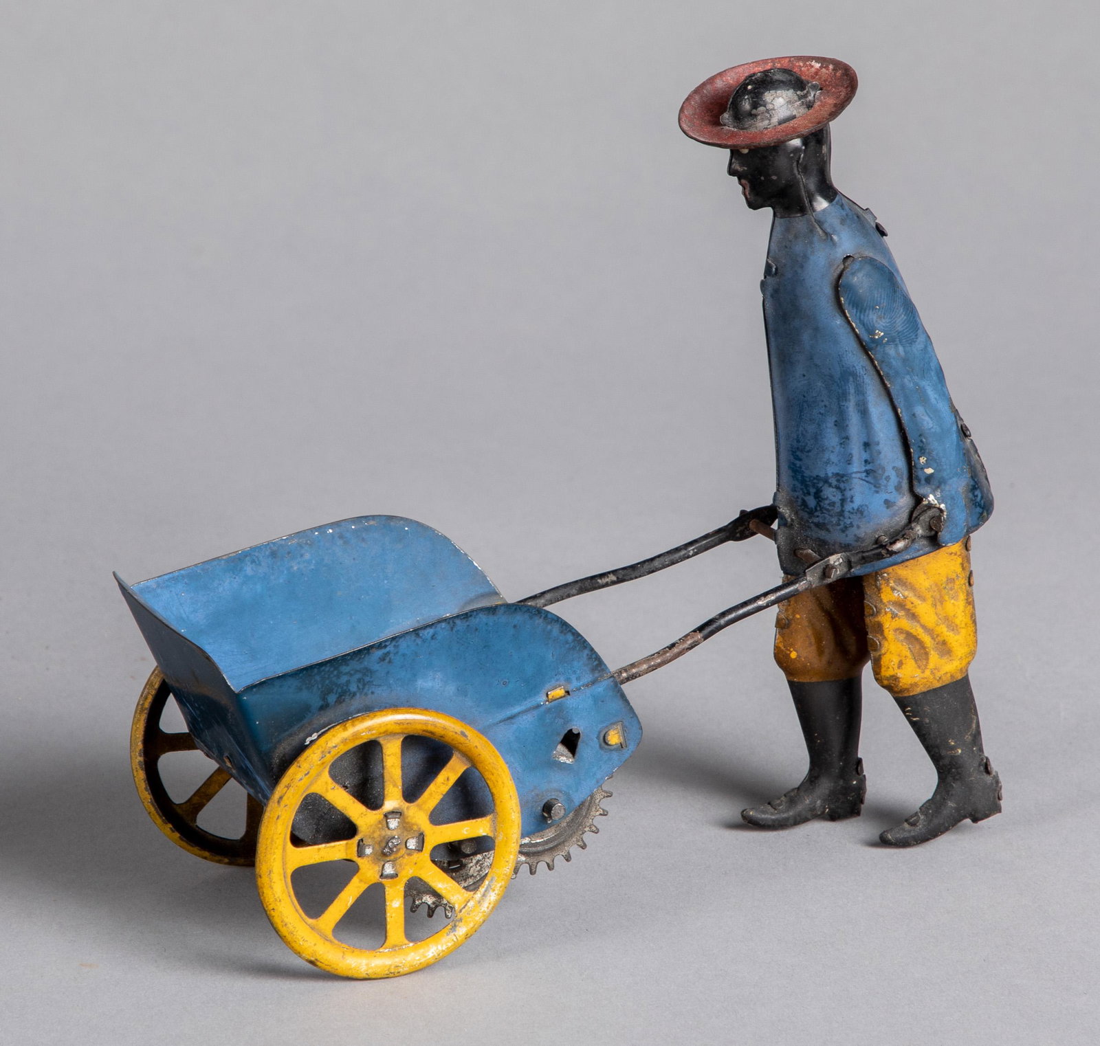 Lehmann painted tin Tip Top wind-up porter: Lehmann painted tin Tip Top wind-up porter, 5 1/2'' h.