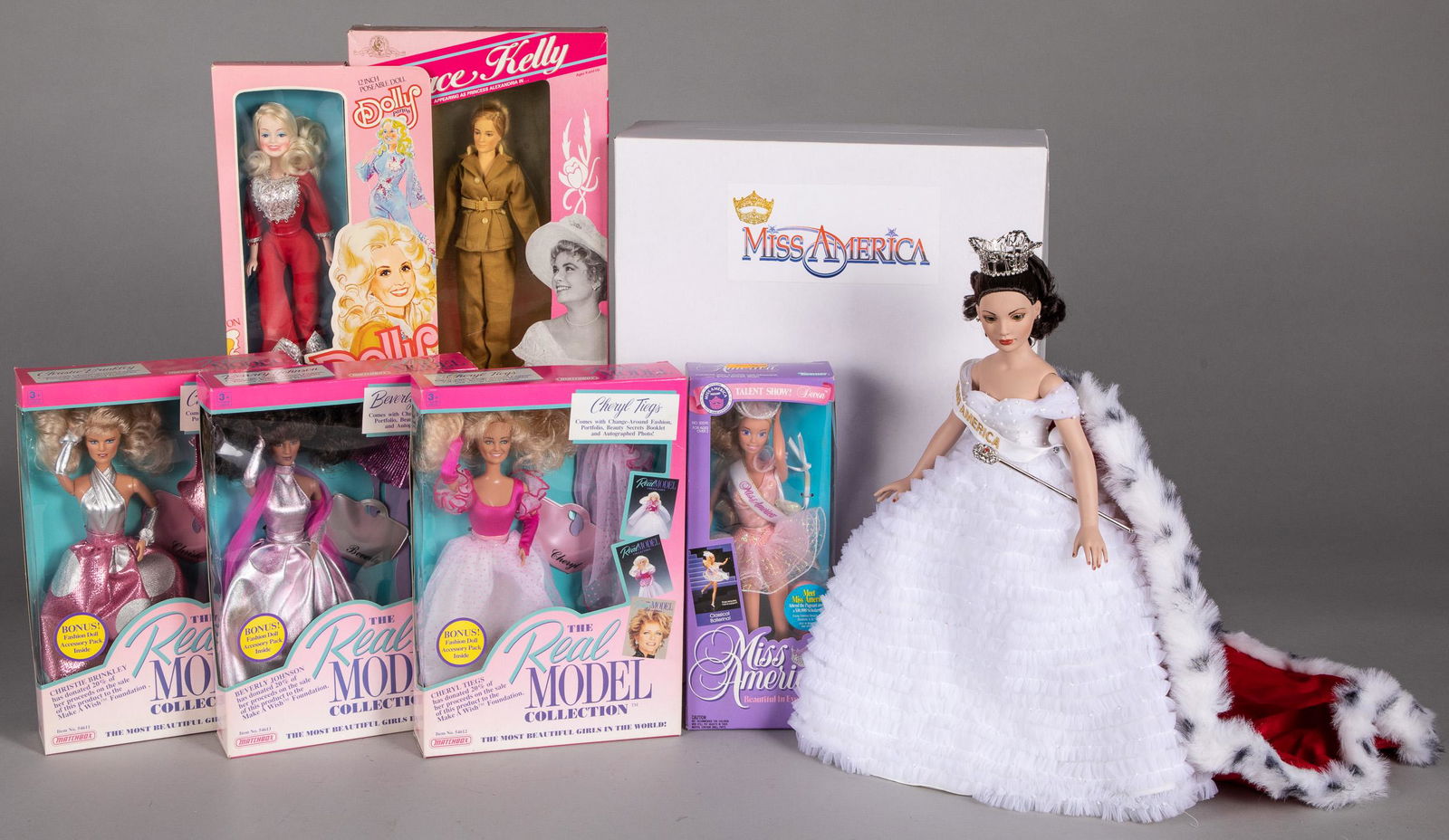 Seven TV personality, musician and celebrity doll: Seven TV personality, musician and celebrity dolls in the original boxes, to include a Tonner 2002 Miss America, a 1991 Kenner Miss America, Tristar 1981 Grace Kelly - The Swan doll, Goldberger Dolly