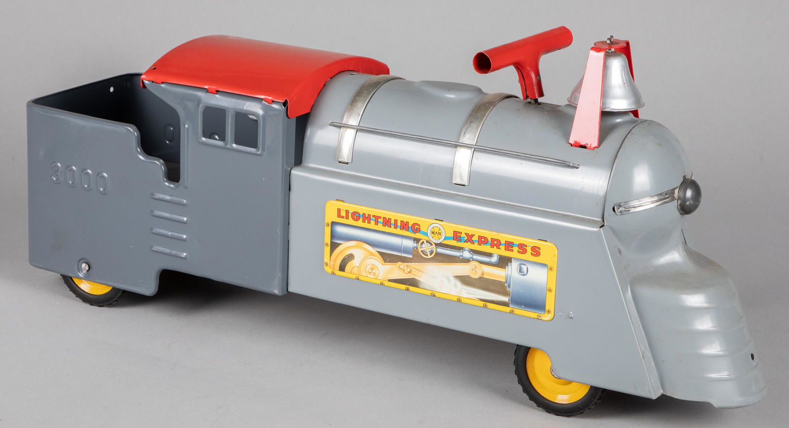 Marx Lightning Express pressed steel ride-on trai: Marx Lightning Express pressed steel ride-on train locomotive, with the original box, 27'' l.