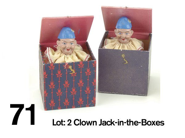 Lot: 2 Clown Jack-in-the-Boxes: painted composition heads on cloth covered spring bodies in lithographed paper on wood boxes, both with squeakers, 1 with Marolin Germany foil label 7" t. ea. open