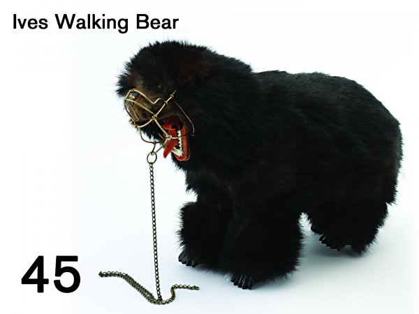 Ives Walking Bear: fur covered clockwork bear with glass eye and nicely detailed muzzled mouth 10" l.