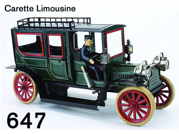 Carette Limousine: Carette Limousine lithographed tin with robust clockwork, this deluxe model features beveled glass windows throughout, original head- and side lamps, opening rear doors, painted metal spoke wheels wit