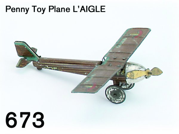 Penny Toy Plane L'AIGLE: Penny Toy Plane L'AIGLE lithographed tin, unpowered 4.25" ws.