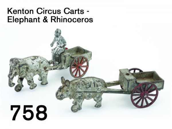 Kenton Circus Carts - Elephant & Rhinoceros: Kenton Circus Carts - Elephant & Rhinoceros painted cast iron with integral cast animals, elephant cart has Hindu driver figure, scarce circus parade carts 8" l.