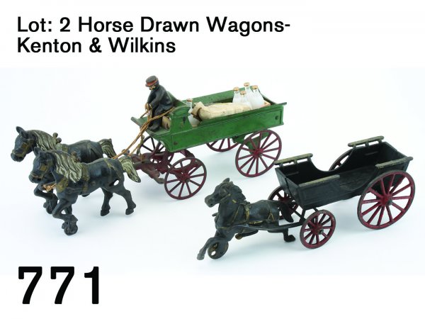Lot: 2 Horse Drawn Wagons - Kenton & Wilkins: Lot: 2 Horse Drawn Wagons - Kenton & Wilkins painted cast iron, includes #5 delivery wagon by Kenton along with a Wilkins scoop side hay wagon larger 15"L.