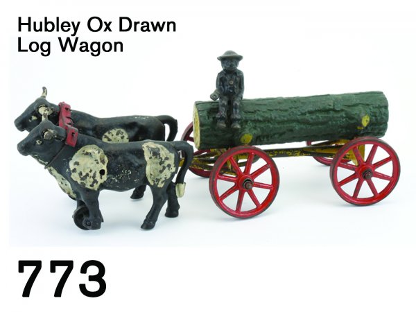 Hubley Ox Drawn Log Wagon: Hubley Ox Drawn Log Wagon painted cast iron with seated figure on removable log 15.5" l.