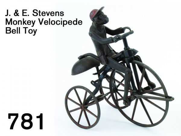 J. & E. Stevens Monkey Velocipede Bell Toy: J. & E. Stevens Monkey Velocipede Bell Toy cast iron with japanned finish, monkey in jacket and cap with articulated legs, riding a tricycle, a classic American bell toy and an above average example,