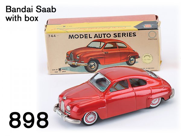 Bandai Saab with box: Bandai Saab with box Japanese made lithographed tin friction powered, this car is from the Bandai "Model Auto Series" and has great detail including colorful interior and original box 7.5" l.