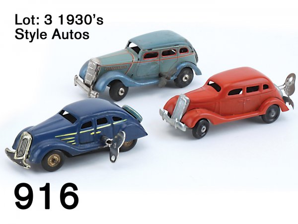 Lot: 3 1930's Style Autos: Lot: 3 1930's Style Autos lithographed tin clockwork power, all have trunk-mounted spare tires - 2 marked "Made in Japan", the other is "Made in US Zone Germany"; 2 cars have manually steerable wheels