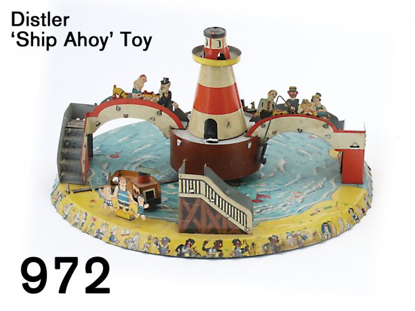 Distler 'Ship Ahoy' Toy: Distler 'Ship Ahoy' Toy lithographed tin with clockwork mechanism, comical and colorful lithography throughout, lighthouse removes for winding access, a fairly scarce Distler piece 9.5" diam.