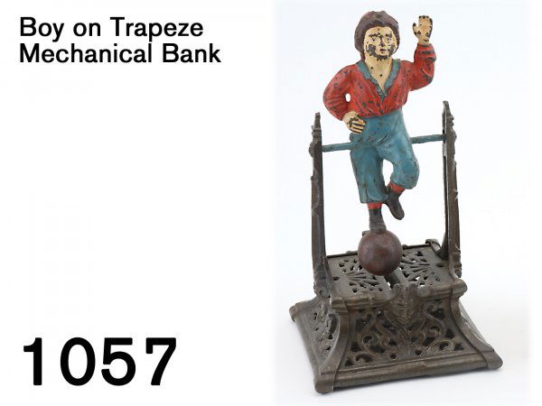 Boy on Trapeze Mechanical Bank: Boy on Trapeze Mechanical Bank also known as Automatic Toy Bank; painted cast iron by J. Barton & Smith Company 9.5" t.