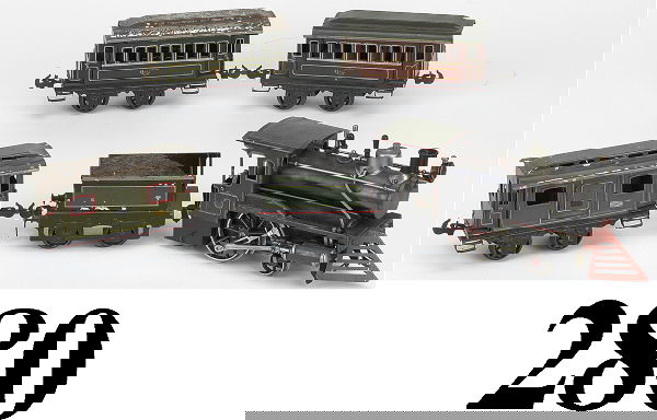 Carette Gauge I Live Steam Passenger Set: Carette Gauge I Live Steam Passenger Set painted tin American steam outline 2-2-0 stork leg engine (boiler shows signs of burning and several dents, 4 wheel tender (paint flaking), and 3 painted tin c