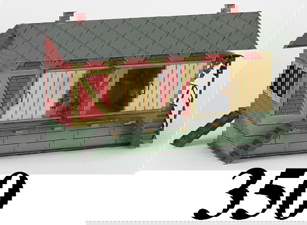 Marklin Freight Station: Marklin Freight Station hand enameled tin with great detailing, 2 sliding doors and platforms on either side with painted cast iron cranes with cranks on each, 2 section interior, 1 end with ornate ca