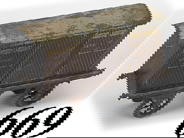 Carette Gauge III Box Car: Carette Gauge III Box Car painted tin European profile car with gold detailing "G.C. & Co. # 134-4" 8.5" l. fair to good (missing couplers, areas of corrosion,overall pitting and wear - worse on roof)