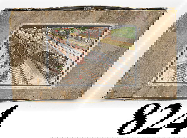 Bing Train Box: Bing Train Box cardboard box, water damaged, colorful paper label shows 'windcutter' steam loco passing an electric outline loco, box has what looks like "1925" hand-written on it 21-1/2 x 3 x 11-3/4