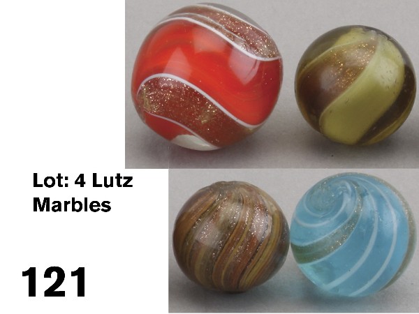 Lot: 4 Lutz Marbles: circa 1880-90, German handmade glass includes 13/16" cinnabar ribbon Lutz marble with wide bright orange red swirl with white edge, polished, excellent example of a rare color, 5/8" four paneled ribbo
