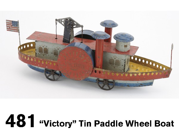 Victory Tin Paddle Wheel Boat: painted and stenciled tin floor toy with cast iron wheels, an unpowered pull toy with beautifully stenciled faux paddle wheel housing, lettering includes "Pat. Feb. 25 1879", die-cast walking beam ope