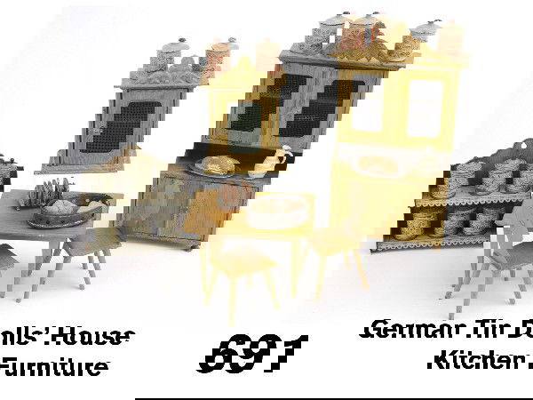 German Tin Dolls' House Kitchen Furniture: painted tin grouping includes Rock & Graner table and 2 chairs, Marklin hutch and wall hanging pie safe, 2 shelf wall unit with 6 blue and white canisters, (some areas of corrosion), 5 canisters in re