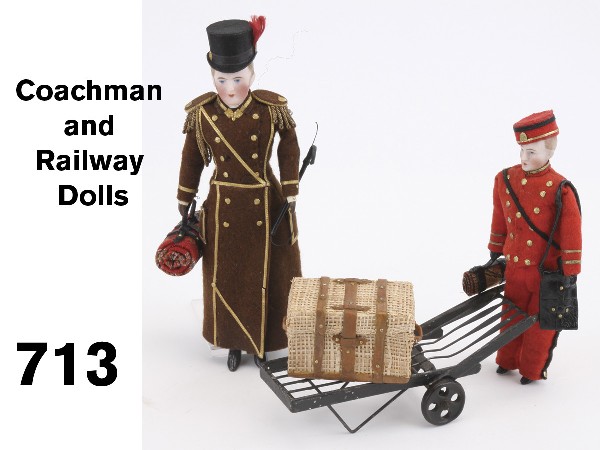 Coachman and Railway Dolls: painted bisque older gentleman dressed as coachman with faux beaver skin top hat and full length coat with Dresden paper trim and buttons and metal bullion fringe on epaulettes, younger looking chap d