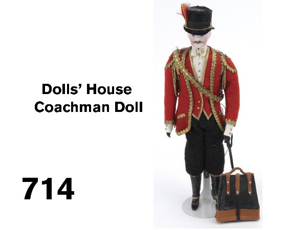 Dolls' House Coachman Doll: bisque gentleman with painted features including mustache with faux leather valise and buggy whip finely dressed in gilt paper and metal trimmed coat and top hat Size: 7.5" t. to top of hat