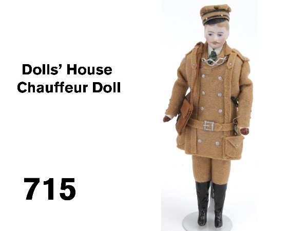 Dolls' House Chauffeur Doll: bisque doll with painted features including mustache outfitted in appropriate costume complete with goggles and start crank Size: 7.5" t. to top of hat