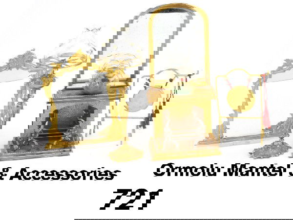 Ormolu Mantel & Accessories: ornate fireplace with attached arched top mirror and pewter tone dolphin andirons, floor lamp with clear glass shade, dinner gong, and elaborate framed mirror Size: mantel 5.75" t. x 2.75" w.