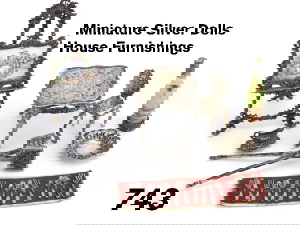 Miniature Silver Dolls House Furnishings: wine bottle coaster, gravy boat with under plate, long handled waffle iron, bowl and miniature 15 piece flatware service for 4 (1 spoon missing) sewn on original silk covered card; all pieces marked s