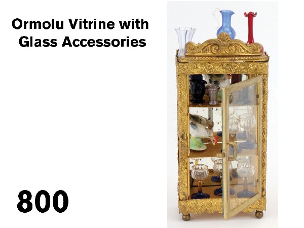 Ormolu Vitrine with Glass Accessories: scarce ormolu dolls' house furnishing by Erhard & Sohne has mirrored back, glass sides and door with 3 shelves (ex. Claire Hewie collection) is offered with a selection of glassware including a set of