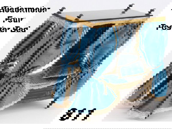 Biedermeier Four Poster Bed: rosewood tone with gilt transfer decoration, period blue silk taffeta and lace trimmed bed curtains, pillows and spread with gold paper border and edgings Size: 6.5" l. x 7.5" t. x 3.5" d.