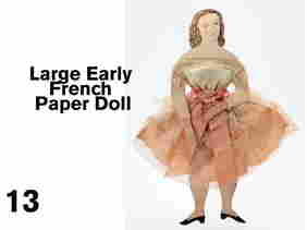 Large Early French Paper Doll: circa 1860-1870, hand colored paper dancer dressed in pierced crepe, tulle and satin cloth dress Size: 15.5" t.