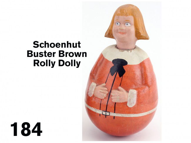 Schoenhut Buster Brown Rolly Dolly: hand painted weighted papier mache toy retaining cloth manufacturer's label on underside Size: 9.5" t.
