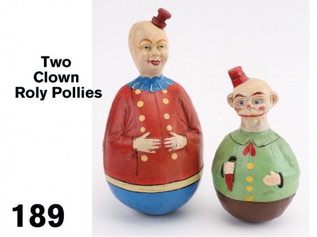 Lot: Two Clown Roly Pollies: Germany, hand painted weighted papier mache figures; smaller marked Germany on reverse of neck Size: 10" t. and 13" t.