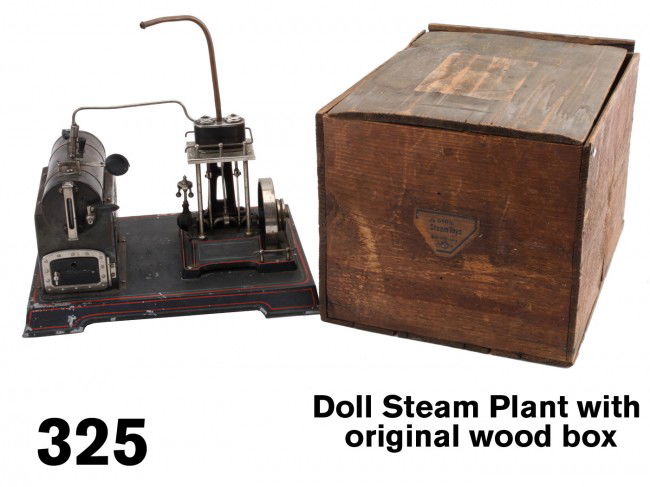 Doll Steam Plant with original wood box: a nicely outfitted horizontal boiler with wood handled valves, enclosed sight glass, original burner, etc. mounted on a painted steel base along side a cast iron double cylinder engine with nickel pla