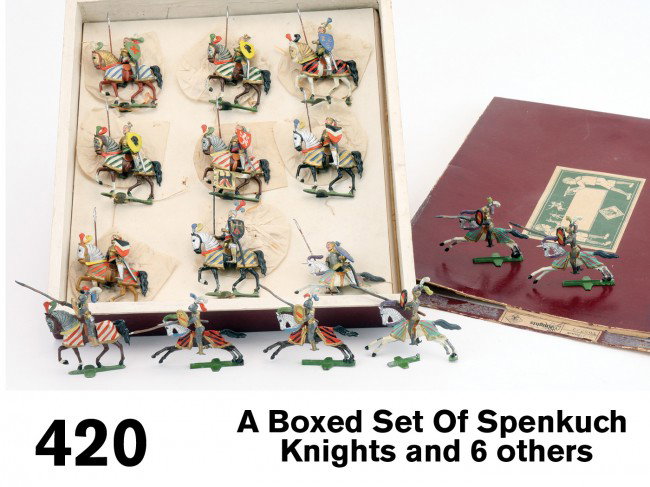 A Boxed Set Of Spenkuch Knights and 6 others: beautifully painted lead figures of knights in armor riding armored horses, the figures each with lance and shield are dismountable; 9 in all they are offered with original paper covered wood box; als
