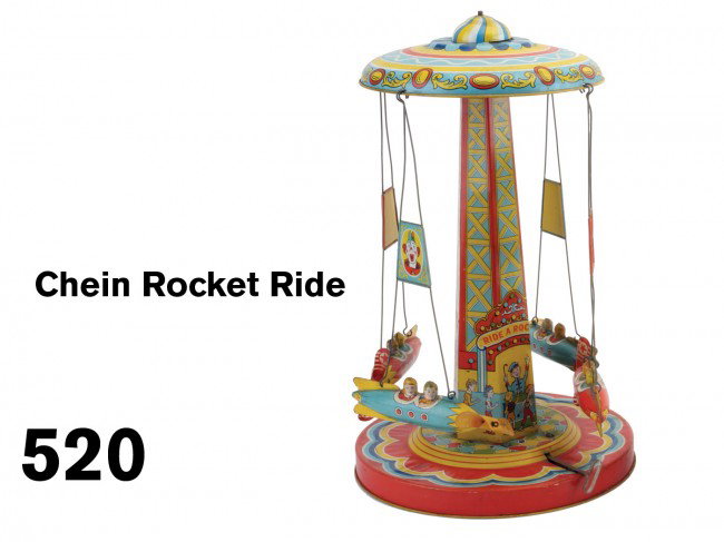 Chein Rocket Ride: lithographed tin, clockwork powered with bell ringing action, retains all original celluloid propellers, this is one of the most desirable Chein amusement park toys Size: 18" t.