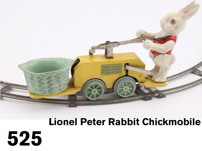 Lionel Peter Rabbit Chickmobile: painted steel handcar with painted composition rabbit and basket - classic clockwork powered Easter toy, offered with circle of track Size: 10" l.