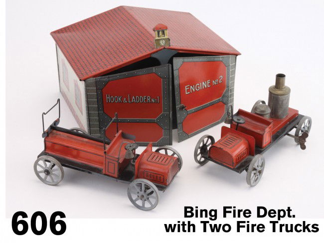 Bing Fire Dept. with Two Fire Trucks: lithographed tin Hook & Ladder No. 1 and Engine No. 2 garage with key wind clockwork pumper and ladder trucks Size: 8.5" w. x 4.75" t., trucks 6" l.