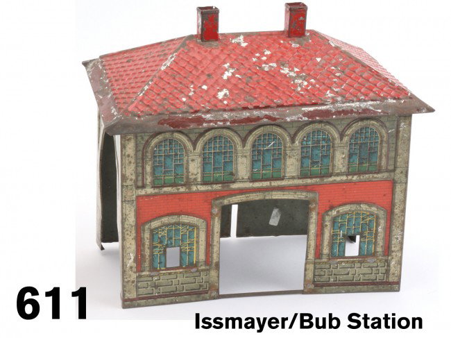 Issmayer/Bub Station: lithographed and painted tin, typical finely detailed Issmayer lithography with embossed tin Ôtile" roof, has pass through opening for 0 or I gauge track Size: 9" l.