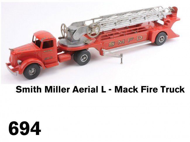 Smith Miller Aerial L - Mack Fire Truck: diecast aluminum, rubber tired wheels, nickel plated ladders, retains original hood ornament and outriggers Size: 36" l.