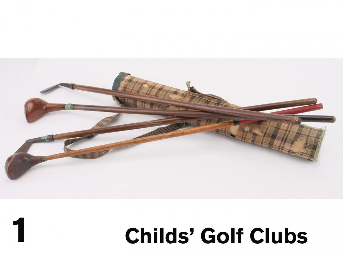Child's Golf Clubs: cloth covered cardboard golf bag with 2 wood drivers and 2 metal putters - putters marked JP Co. - NYC, longest club 27" l.