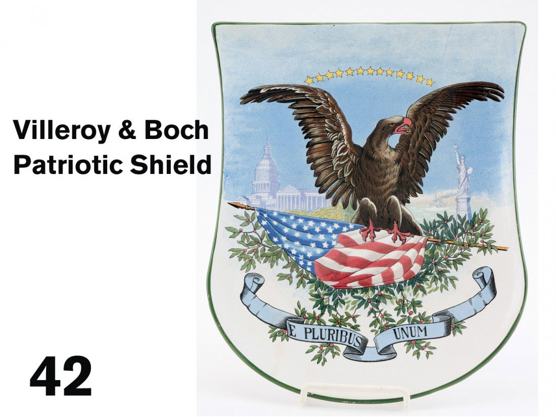 Villeroy & Boch Patriotic Shield: glazed porcelain plate in great shield form marked on back Villeroy & Boch, Mettlach 'U S', #3225/1290 with artist markings; 11" x 13.25"