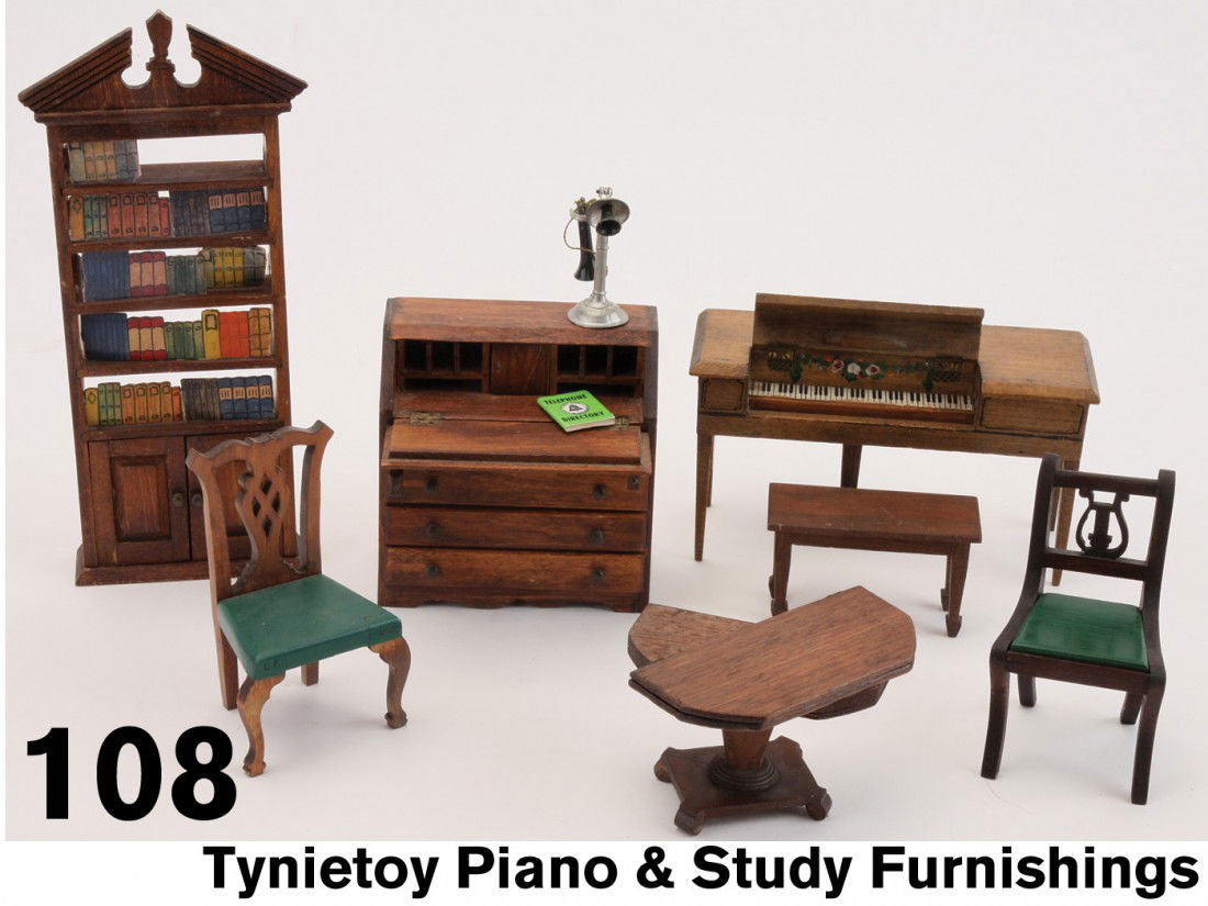 Tynietoy Piano & Study Furnishings: stained wood grouping includes bookcase (white stamp maker's mark), Winthrop desk with phone and directory, Astor piano with stool, a pedestal flip top side table, Chippendale side chair with green pa