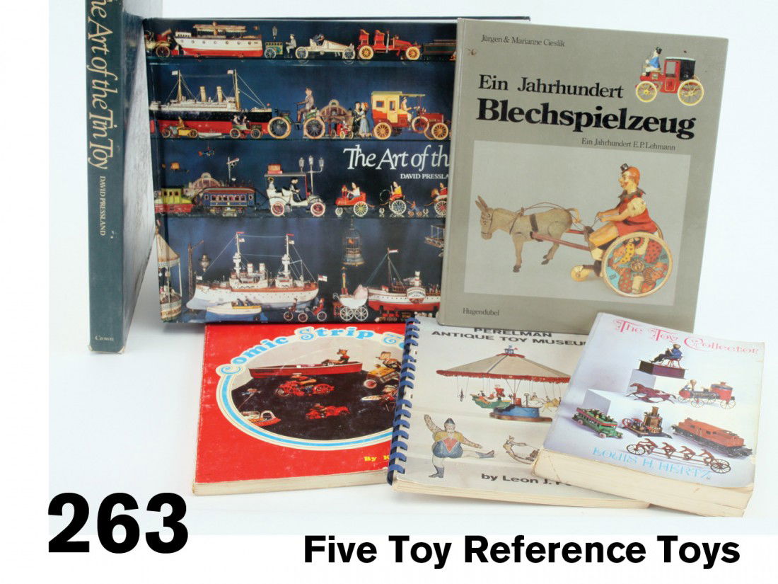 Five Toy Reference Toys: included is hardback art of the Tin Toy by Pressland with slip case, The Toy Collector by Hertz, Comic Strip Toys, Perelman Antique Toy Museum and a German language book by Cieslik;largest 10.5" x 13"