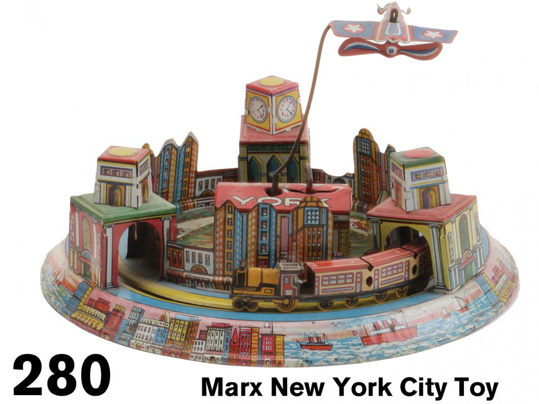 Marx New York City Toy: lithographed tin clockwork toy depicts train and plane rotating around cityscape;9.5" diam.
