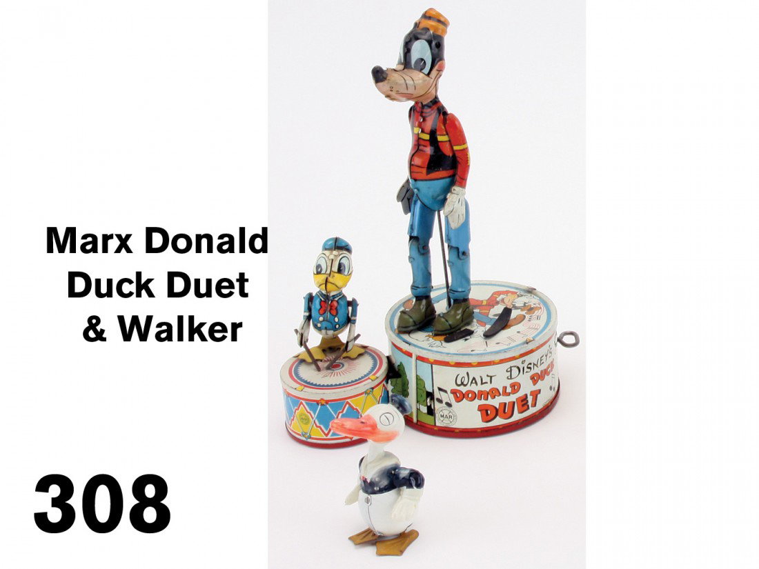 Marx Donald Duck Duet & Walker: lithographed tin clockwork dancing drumming duet by Marx along with painted tin and celluloid walker marked Japan;10.5" t.