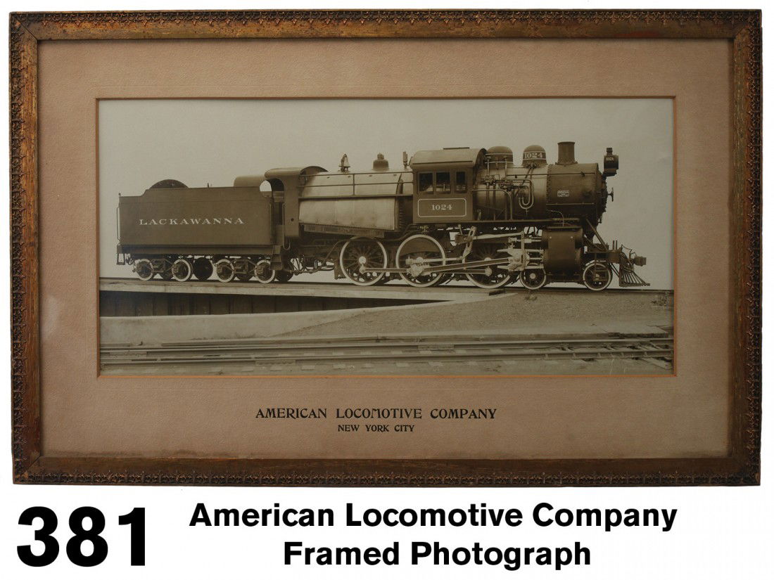 American Locomotive Company Framed Photograph: original photograph in original identifying mat and what appears to be original frame, great image of an unusual configured double cab style 4-6-0 locomotive with Lackawanna tender;19" x 30"
